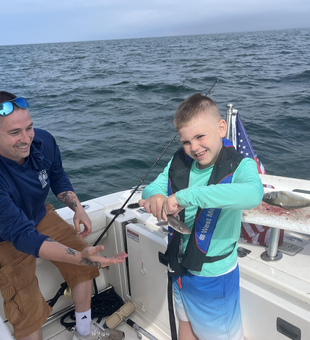 Cloudy skies set the perfect backdrop for deep sea jigging adventures!