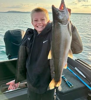 Youngster and his catch almost his size - Lake Michigan