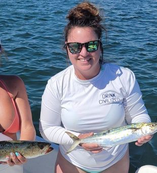 Sunny inshore fishing catch with Spanish mackerel and spotted seatrout