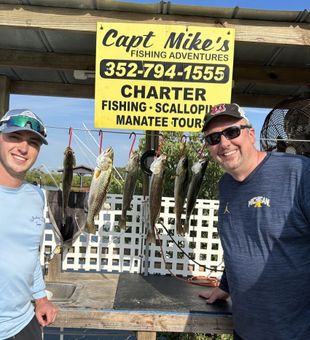 Productive charter fishing day with spotted seatrout catch