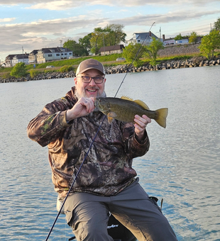 Drifting fishing in the rain yields a fine smallmouth bass!