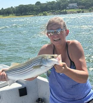 Book a Lake Texoma striped bass fishing charter and reel in hard-fighting fish with an experienced local guide.