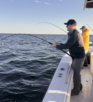 Rods bent and fish on! Clear conditions made for an exciting day on the water.