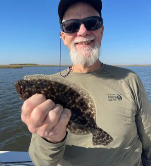 Flounder Hooked on New Orleans fishing!