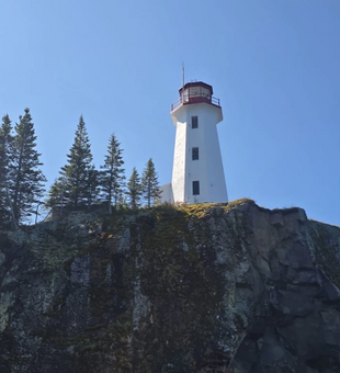 Iconic lighthouse marks stunning Nipigon waters for cruising adventures.
