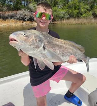 Redfish bite was on fire today at Fort Morgan near Gulf Shores. Alabama Gulf Coast fishing never disappoints.
