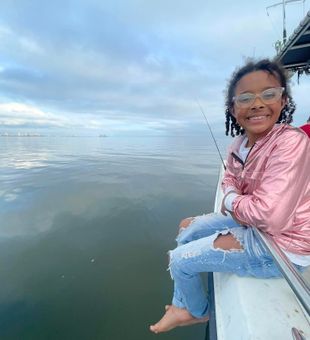 Little Girl waiting for her fish - Gautier, MS. 