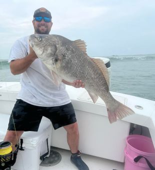 Big smiles and fresh catches all around.