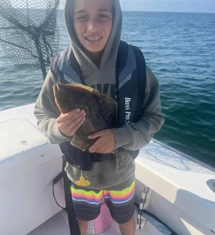 Flat fish, full smiles, perfect fishing day ahead.