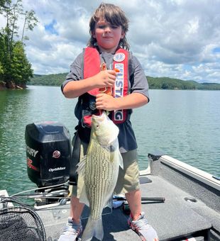 Young angler with a big Striped Bass!