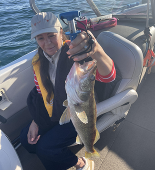 15-inch walleye reeled in on a crystal-clear day!