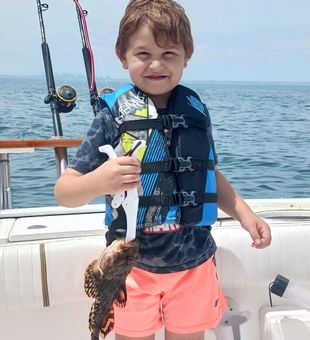Hook, line, and Trinacria in Boston Harbor