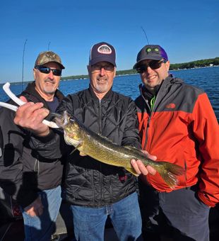  Reeling in a trophy Walleye in Wisconsin.