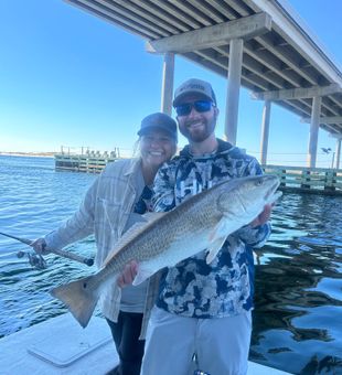 Lovely couple fishing in Fort Walton