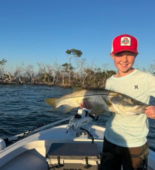 Big snook catch by young angler on inshore fishing trip