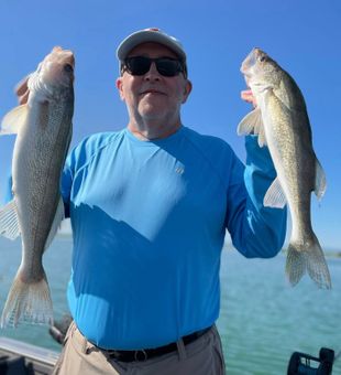 Jig and pause, walleye strike perfection