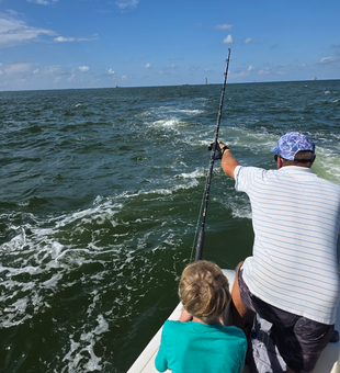 Mastering the art of deep sea jigging in Gulf Shores' shifting weather!
