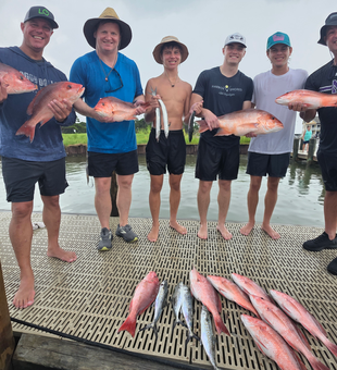 Triple Red Snapper success in Gulf Shores' partly cloudy waters!