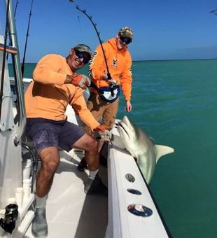 Capt Scotty showing the Shark who is BOSS