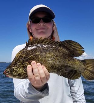 Gulf Coast angler with a chunky Tripletail.