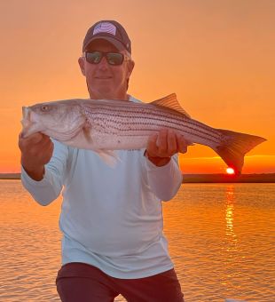 topwater stripers at sunset