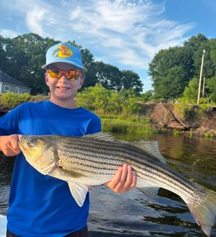 Young angler’s impressive striped bass catch