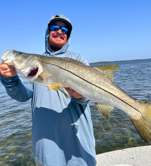 Caught a beauty on a perfect day by the water.