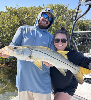 Caught a beauty on the tranquil waters!