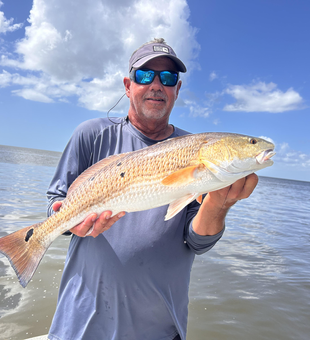 Nice redfish caught using trolling and drift fishing techniques at PaddleTail Waterfront Lodge!