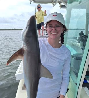 Big smiles and even bigger fish in Anna Maria Island with Gulf Goats Charters!