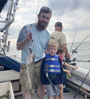 Proud family walleye catch on Lake Erie