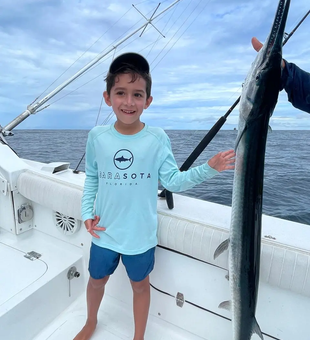 Young angler with an impressive Needlefish catch in Playa Flamingo!