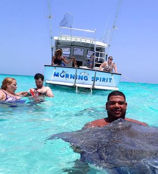Amazing stingray encounter in Cayman Islands crystal waters!