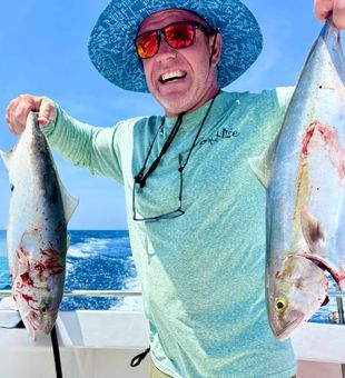 Double Amberjack catch—strong and action-packed!