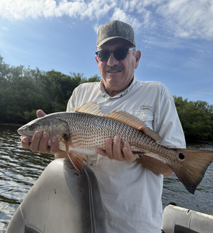 Nice redfish using bait casting and heavy tackle in clear conditions!