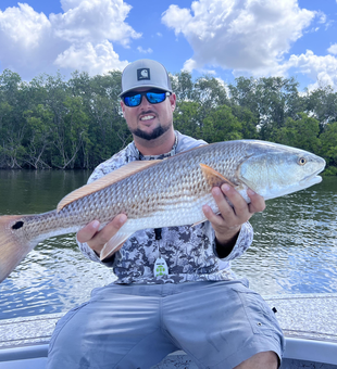 Huge redfish reeled in during a stormy day at Williams Park!