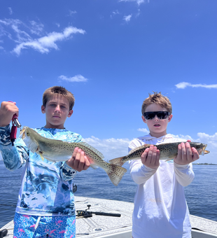 Landing a Spotted Weakfish on a partly cloudy day in Riverview!
