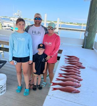 Orange Beach red snapper on the line