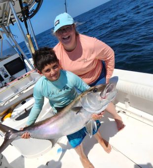 Powerful amberjack catch on deep sea fishing charter