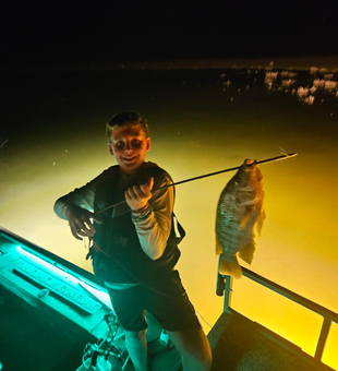 Lake Amistad nights + bowfishing lights = memories that last forever.