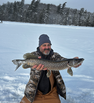 Massive Adirondack northern pike through the ice!
