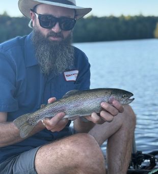 Colorful Rainbow Trout catch on the lake.