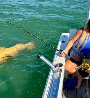 Marco Island Florida fishing at its finest under clear Gulf skies.