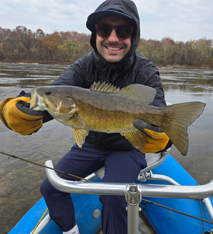 Nice smallmouth bass using jigging technique on the river today!
