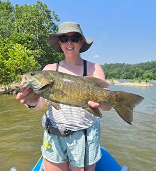 Huge 26-inch Smallmouth Bass reeled in during a partly cloudy day!