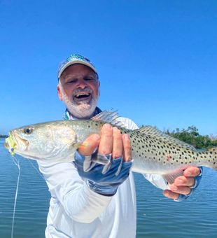 Nice Spotted Seatrout in glassy Florida waters.