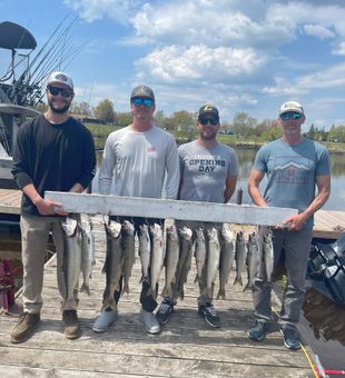 Big catch on the dock! Lake Trout haul with the crew.
