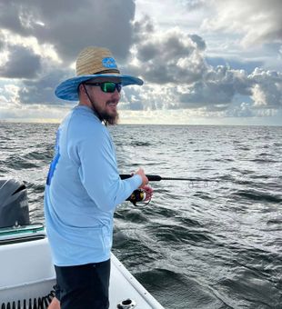 Sunrise, saltwater, and a line in the Gulf. 