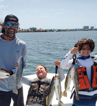 The Joy and Excitement that the family had while fishing in South Padre Island, TX.