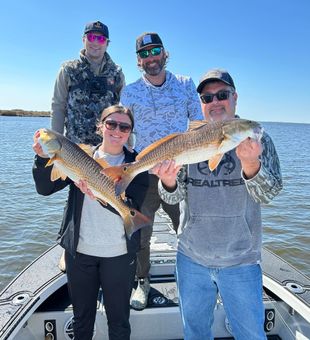 Family time and redfish smiles in Port Sulphur! 